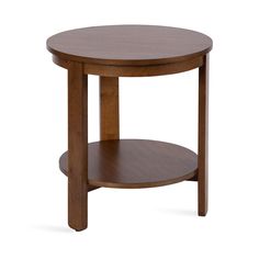 a round wooden table with one shelf on the side