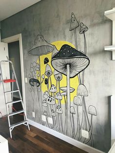 a painting on the side of a wall with mushrooms painted on it and a ladder