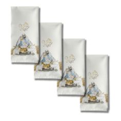 three napkins with nativity images on them