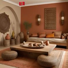 a living room filled with lots of furniture and decor on top of a carpeted floor