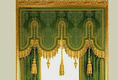 an ornately decorated room with green curtains and gold trimmings on the windowsill