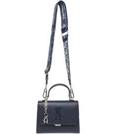 From Steve Madden&#x2C; the Lattuca Top Handle Satchel Bag features: PU exteriorPush-lock closureSteve Madden logo charm clipInterior back wall zip pocketInterior front wall slip pocket4 metal bottom feetApprox. 3" handle strapApprox. 24"  max drop removable logo webbing crossbody strapApprox. 8.25" x 2.5" D x 6.25" HImported. Front Wall, Satchel Bag, Dillard's, Satchel Bags, Top Handle, Steve Madden, Satchel, Navy, Leather