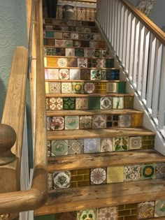 the stairs are decorated with colorful tiles