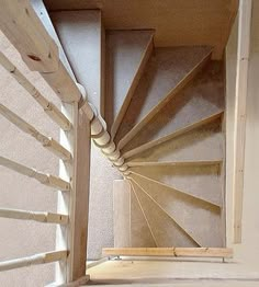 an image of a wooden staircase going up