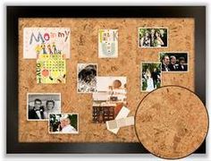 a cork board with pictures and magnets on it