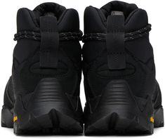 the nike air more uptempose is shown in black