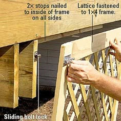 a person is attaching a wooden fence to the side of a building with instructions on how to install it