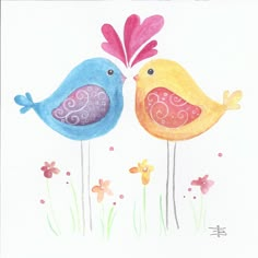 two colorful birds standing next to each other on top of a grass covered field with flowers