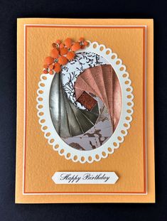 a birthday card with an orange and white background