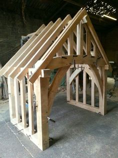 a wooden structure is being built in a garage