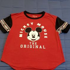 Mickey Mouse, The Original- Logo T-Shirt. Fabrication Tag Attached. Love The Sleeves With Logo Print. Great Fun Tee To Have! Never Worn. Sporty Mickey Mouse Crew Neck Top, Minnie Mouse Crew Neck Top For Disney Events, Pop Culture Crew Neck Tops For Disney Fan Events, Disney Mickey Mouse Fan Merchandise Tops, Pop Culture Mickey Mouse Tops For Disney Fan Events, Minnie Mouse Graphic Tee Short Sleeve, Cute Mickey Mouse Crew Neck Top, Minnie Mouse Graphic Tee Short Sleeve Top, Short Sleeve Mickey Mouse Tops For Disney Fan Events