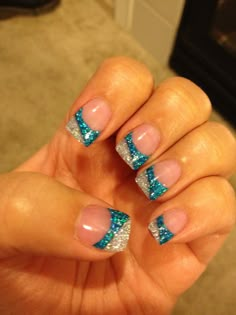 Colored Acrylic Tips, Teal Nail Tip Designs, Fancy French Tip Nails, Blue And Silver Nail Designs French Tips, Dark Blue Nails With Glitter Silver French Tips, Blue Sparkly Tips Nails, Cool French Tip Nail Designs, Silver Nails Blue Accent, Vacation Nails Summer