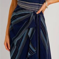 New, No Tags. Never Worn. A Faux-Wrap Silhouette, Cascading Ruffles, And Soothing Stripes In A Myriad Of Blue Hues Bring A Sense Of Fluidity To This Beautiful Midi Skirt, Which Is Cut From Delicate Crinkle Georgette For A Graceful Drape And Airy Feel. From Lauren Ralph Lauren, This Skirt Features: A-Line Silhouette Attached Self-Tie Accent At The Left Waist Creates A Faux-Wrap Silhouette Cascading Ruffle At The Front Left Waist Front Waist Pleats Intended To Hit At The Mid-Calf Fully Lined Conce Chic Fitted Blue Wrap Skirt, Chic Blue Lined Wrap Skirt, Chic Pleated Wrap Skirt For Summer, Elegant Blue Wrap Skirt For Summer, Elegant Blue Summer Wrap Skirt, Fitted Blue Wrap Skirt For Beach, Fitted Blue Wrap Skirt For The Beach, Chic Navy Skirt For Summer, Ralph Lauren Skirts