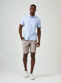 Smiling is easy in this stretch premium cotton short sleeve shirts. The geometric pattern stands out without being busy; while the 7DIAMONDS signature details elevate the style. Details Model is 6'1" and wears a size medium. Care: Machine wash cold on delicate cycle, low tumble dry, do not iron Composition: 50% Cotton/ 46% Polyester/ 4% Spandex Light Blue Short Sleeve Shirt For Work, Summer Business Casual Cotton Short Sleeve Shirt, Light Blue Short Sleeve Shirt For Business Casual, Light Blue Tops For Business Casual Summer, Light Blue Summer Tops For Business Casual, Button Up With Shorts, Short Sleeve Shirt Outfit, Shirt Outfit Men, Denim Accessories