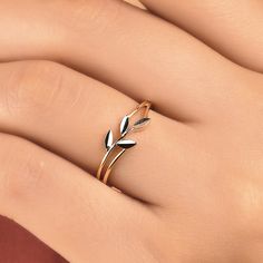 The design of this ring, adorned with delicate branches and leaves that wrap around your finger, is inspired by the graceful olive branch. It is unique and eye-catching with sparkling cubic zirconia stones on the leaf parts. It can be stacked or used alone. RING DETAILS ♥ Gold Karat: 14 karat Solid Gold ♥ Stones: AAA Cubic Zirconia ♥ Our products are hallmarked "14K" or "585". ♥ Ring Band Color Available; White, Yellow, Rose Gold ♥ Ready to Ship 2-3 Working Days ♥If you would like this ring in 10k or 18k gold, please message me for the price. 🎁 PACKAGING Each item comes in a premium gift jewellery box and wrapped beautifully as a gift. If you would like us to include a gift note in the parcel, please leave us a message with your order about the content of the note. We would love to prepar Leaf Parts, Leaf Ring Design, Olive Branch Ring, Thick Gold Ring, Olive Leaf Ring, Gold Twigs, Gold Leaf Rings, Leaf Engagement Ring, Branch Ring