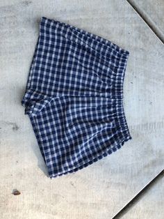 Blue Plaid Shorts. Great to wear for your next festival. Super cute summer shorts. Super cute and really comfy shorts. Made from cotton shirting with an elastic waist band. Great gift for a birthday, holiday or even a treat for yourself. All of my shorts are made to order so if you have a special request you can leave me a note with your order telling me your exact size specifications. If you don't see your size, if you need the shorts bigger or smaller just tell me and I can make it whatever si Casual Blue Boxer Briefs For Beach Season, Blue Short Boxer Briefs For Beach, Beachwear Bottoms With Built-in Shorts, Cotton Beachwear Bottoms With Built-in Shorts, Blue Short Boxer Briefs For Vacation, Casual Blue Boxer Briefs For Summer, Cotton Swim Trunks With Built-in Shorts, Summer Cotton Boxer Briefs For Loungewear, Cotton Shorts For Beach Season