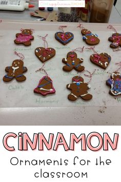 cinnamon ornaments for the classroom are displayed on a white board with pink and blue writing