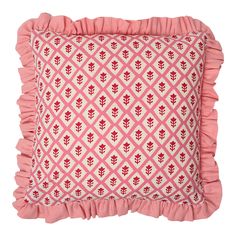 a pink and white pillow with ruffled edges