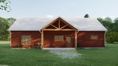 a large red barn style house sitting on top of a lush green field