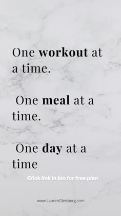 a marble wall with the words one workout at a time, one meal at a time