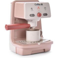 a pink coffee maker with a white cup