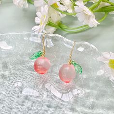 🍀 Size: 2.9 x 1.2 cm 🍀 Material: 14K Gold Plated Sterling Silver Hook, Glass, Resin (✨Hypoallergenic Hook✨) Description  🌸 Translucent Peach Earrings with resin leaf and 14K Gold Plated Sterling Silver Hook, create such a cute and refreshing look. Waterproof and hypoallergenic. 🌸 ⭐️ Shop more styles at https://etsy.com/uk/shop/StrawberryAtoll. ⭐️ * Shipping *  🇬🇧 Free shipping for UK orders. All our items will be shipped within 1-2 days.  * Packaging & Gift Wrap * 🎀 All our products are p Summer Pink Earrings With Fruit Design, Peach Drop Earrings For Gift, Cheap Pink Fruit Design Earrings, Cute Fruit Design Dangle Jewelry, Handmade Peach Dangle Earrings, Cottagecore Food, Earrings Cottagecore, Peach Earrings, Fruit Earrings