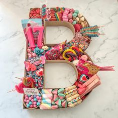 the letter b is made out of candy and candies