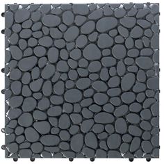 a black tile with pebbles on it