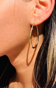 One of our best selling hoops! A lightweight statement pair perfect for everyday wear. 18kt Gold Filled Large Hoop Earrings Tarnish resistant- hypoallergenic- Lightweight Hoop Size: 50mm Width: 3mm Clasp: Hinged  Material: 18 Karat Gold Filled, Hypoallergenic. Tarnish Resistant. Gold-filled does not de-laminate or peel like Gold plated Jewelry nor does it tarnish as readily as silver. Generally speaking, gold filled is better quality and will have a much longer lasting color than plated jewelry. We recommend keeping abrasive chemicals away from the jewelry for the items to last. Thank you for visiting and supporting our small business! We hope you will find a stylish piece that speaks to you! ♥ All of our piece our carefully curated and handmade by our all-female team in Miami, Fl ♥ Our ma Hypoallergenic Dangle Hoop Earrings, Trendy Teardrop Tarnish-resistant Hoop Earrings, Everyday Small Hoop Teardrop Earrings, Nickel-free Teardrop Hoop Earrings, Simple Gold Hoop Earrings, Gold Filled Hoops, Earrings Dainty, Alessandra Ambrosio, Large Hoop Earrings