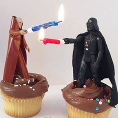 star wars cupcakes with candles in the shape of darth vader and darth vader