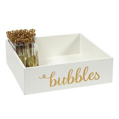 a white box filled with lots of bottles and some pretzels in the bottom