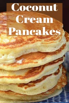 a stack of pancakes sitting on top of a blue and white plate