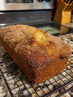 a loaf of bread sitting on top of a cooling rack