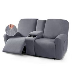 the reclining loveseat with cup holders and arm rest is shown in grey fabric