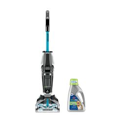 a vacuum cleaner next to a bottle of detergent on a white background with the same product in front of it