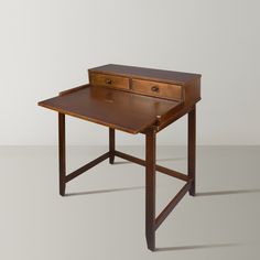 an old wooden desk with two drawers on one side and a drawer on the other