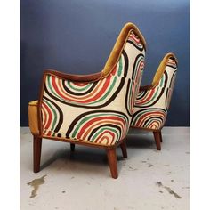 a pair of art deco lounge chairs