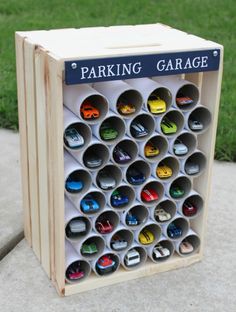 a wooden box filled with lots of magnets