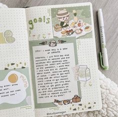 an open notebook with writing on it and a green pen next to the page that says goals