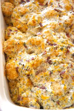 a casserole dish filled with meat and cheese