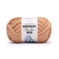 bernat blanketed big yarn ball in light brown, on white background with tag