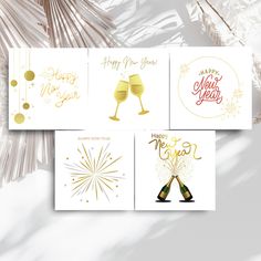 four new year's greeting cards with champagne glasses