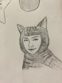 a drawing of a person wearing a cat hat and hood with an ornament in the background