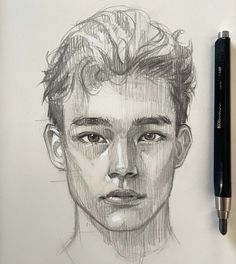 a pencil drawing of a young man's face