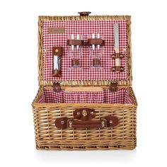 a picnic basket with utensils in it