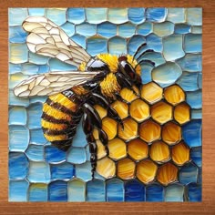 a painting of a bee sitting on top of a honeycomb