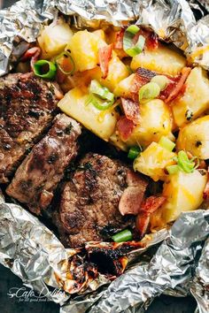 steak with pineapple salsa and potatoes in foil