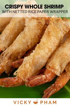 crispy whole shrimp with netted rice paper wrapper on a green banana leaf