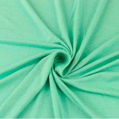 "This jersey knit fabric material is thin, medium weight and stretchy. It has a very smooth, flowing fit and comfy feel. Perfect for t-shirts, casual wear, stylish jumpsuits, dresses, pajamas, head accessories and all kind of DIY crafts. FABRIC INFO + Color: Seafoam Lt-D + Width: 58/60\" inches + Weight: 180 GSM (Grams per Square Meter) + Content: 95% Rayon, 5% Spandex + Stretches: Stretchy COLORS To view other colors available for this fabric click on the following link: https://www.etsy.com/sh Sewing Supplies Storage, Stylish Jumpsuit, Green Mint, Fabric Suppliers, Fur Fabrics, Diy Ribbon, Head Accessories, Arts And Crafts Supplies, Jersey Knit Fabric