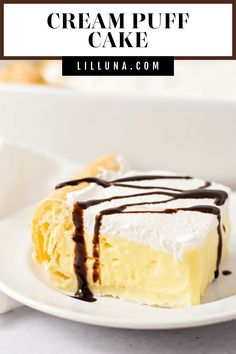 a piece of cream puff cake on a white plate with chocolate drizzles